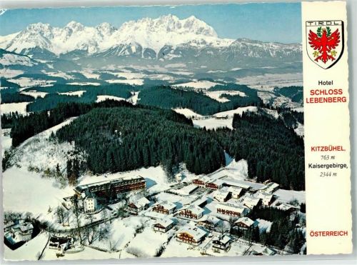 Kitzbühel Hotel Schloss Lebenberg Fliegeraufnahme Kaisergebirge Winter Schnee Wappen Adler Rot