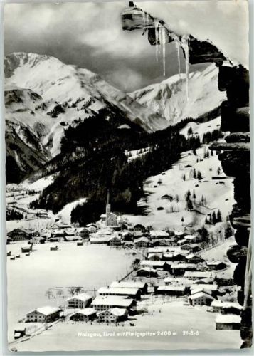 Holzgau Tirol Pimigspitze 2400 m Winter Schnee Kirche Eiszapfen