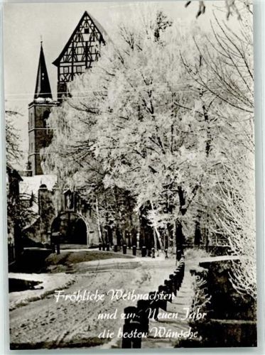 Münnerstadt Fröhliche Weihnachten und zum neuen Jahr die besten Wünsche Kirche Fachwerk Winter Schnee Foto AK