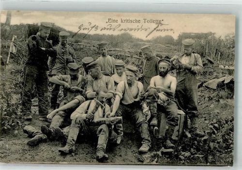 Unteroffiziere beaufsichtigen das Ausbessern der Uniform im Felde Feldpost WK I Landsturm Inf.-Batl. Landau