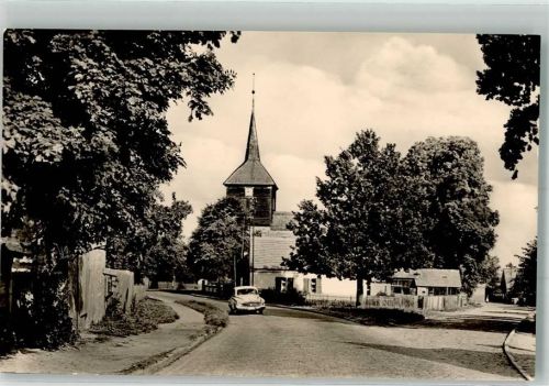 Jatznick Ortseingang mit der Dorfkirche Fotograf Kühn VEB Bild und Heimat
