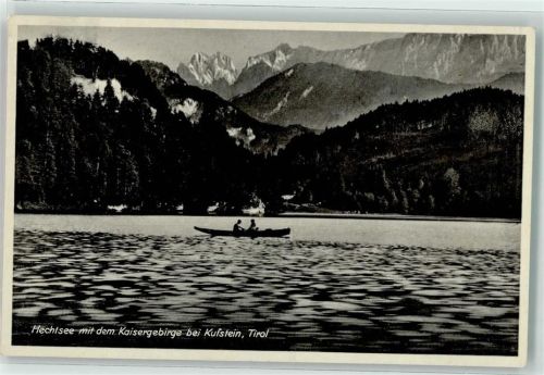 Kufstein Hechtsee mit dem Kaisrgebirge Ruderboot