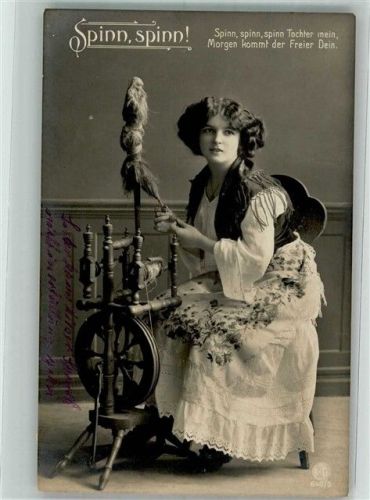 1911 Junge Frau in Tracht am Spinnrad