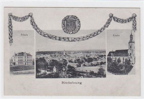 Radeburg Radeburg bei Dresden. Schule Kirche Gesamtansicht mit Wappen gelaufen am 13.2.1919. Wurde vermutlich im Umschlag verschickt. Unterer Rand leicht oxydiert, sonst gut erhalten.