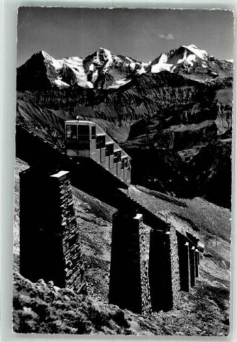 Mülenen Die Niesenbahn mit Eiger Mönch und Jungfrau Fotograf Gyger