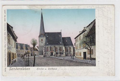 Lunakarte von Sandersleben mit Kirche und Rathaus gelaufen 1903. Leichter Stempeldurchdruck. Leicht fleckig, sonst gut erhalten.