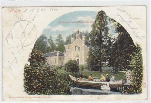 Wörlitz Wörlitz mit Partie am Gothischen Haus gelaufen von 1900. Die Ak ist leicht fleckig und hat einen Stempeldruck.