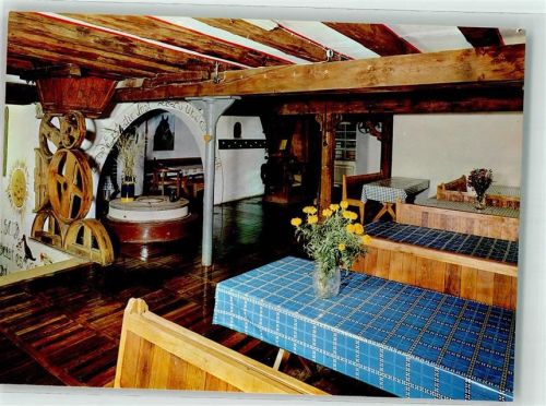 Hadamar Jugendfreizeitstätte Hirsenmühle Holz Rad Blumen Vase Gastraum