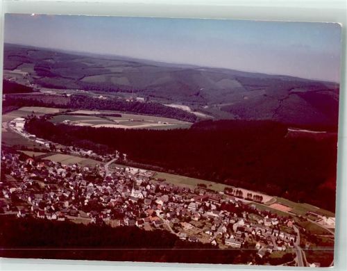 Freienohl Fliegeraufnahme des Ortes mit St. Nikolaus Kirche Foto Original aus Archiv eines Ansichtskartenverlags Ort handschriftlich