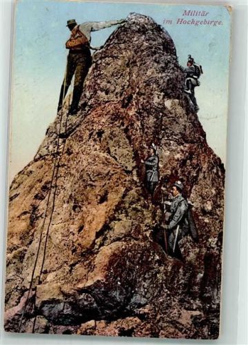 1915 Österreichische Landser in Uniform erklimmen einen Fels im Hochgebirge