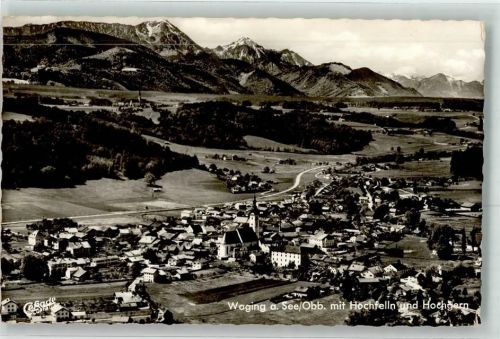 83329 W8221 Waging a. See Foto AK Fliegeraufnahme des Ortes mit Kirche St. Martin Hochfelln und Hochgern Hüttenstempel Strandkurhaus
