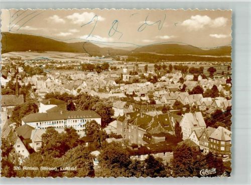 Rinteln Fliegeraufnahme des Ortes mit der St. Nikolai Kirche Foto Original aus Archiv eines Ansichtskartenverlages Farbstriche im Bild