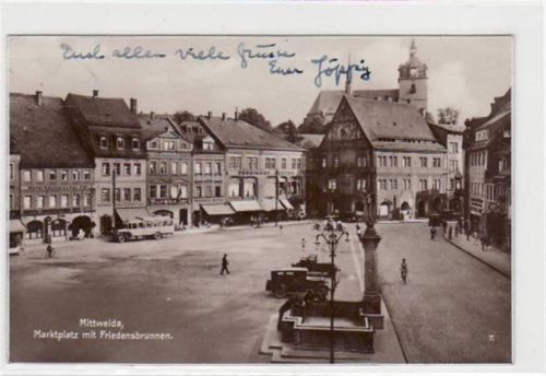 Mittweida mit Marktplatz und Friedensbrunnen gelaufen, Datum nicht lesbar. Leichter Stempeldurchdruck, kleine Knicke oben links, sonst gut erhalten.