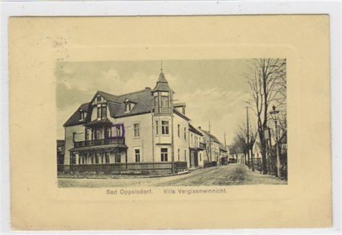 Bad Oppelsdorf Passepartoutkarte Bad Oppelsdorf - Opolno Zdrój / Kreis Görlitz - Zgorzelec. Villa Vergissmeinnicht gelaufen 1930. Leichte Stempelspuren. Leichte Büge unten links und rechts an den Ecke n, sonst gut erhalten