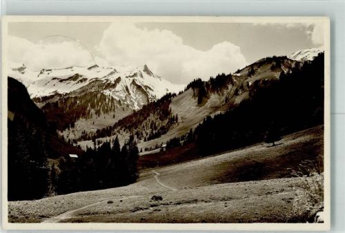 Hindelang Das Oberdorf beim Giebelhaus 851 m Schnee Berge Wolken