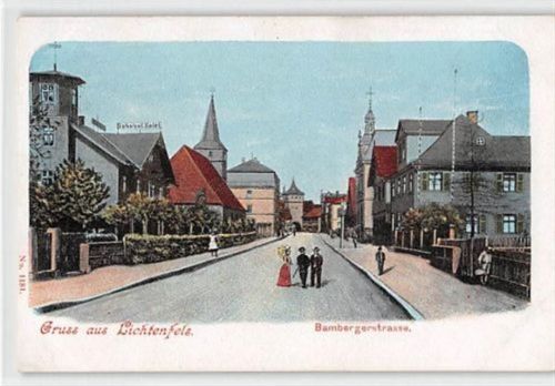 Lichtenfels. Bambergerstrasse mit Bahnhof Hotel ungelaufen Ecken mit Albumabdrücken, sonst gut erhalten
