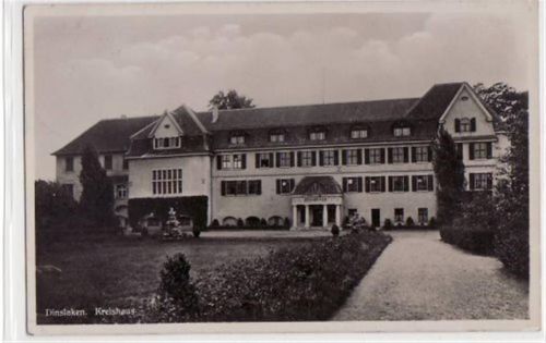 Dinslaken mit Kreishaus gelaufen, mit Marke und Stempel von 1935. Gute Erhaltung.