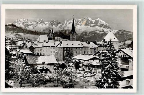 Kitzbühel Kirche Winter Schnee Turm Berge Wilder Kaiser