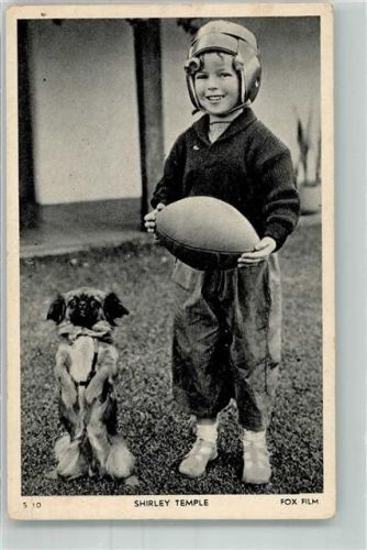 Portrait der kindlichen Schauspielerin Shirley Temple mit Hund