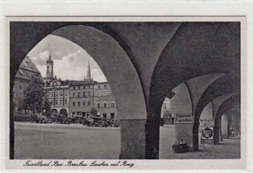 Friedland Friedland / Mieroszów, Bez. Breslau - Kreis Waldenburg / Walbrzych. Lauben Ring und Werbeschilder ungelaufen Sehr gut erhalten.