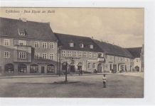 Eydtkuhnen / Eydtkau - Tschernyschewskoje Neue Häuser am Markt mit Adler Apotheke und Geschäften gelaufen 1925. Leichter Stempeldurchdruck, sonst gut erhalten.