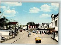24392 W2347 Süderbrarup 1975 Foto AK Große Straße Auto Geschäft