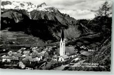 6542 Nauders 1965 Foto AK mit Pfarrkirche St. Valentin und Piz Mondin
