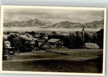 83607 W8150 Holzkirchen , Oberbay Foto AK mit St. Laurentius Kirche und Alpenpanorama