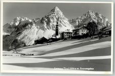 6631 Lermoos Winter mit Dorfkirche St. Katharina und Sonnenspitze im Schnee