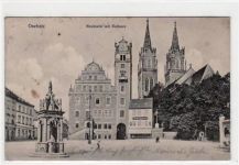 Oschatz mit Neumarkt und Rathaus gelaufen von 1913 kleiner Knick oben rechts, leichte Stempelspuren, leicht stockfleckig, sonst gut erhalten.
