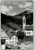 6534 Serfaus Foto AK 1427 m Kirche Uhr Auto