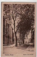 Datteln mit Partie an der Kirche gelaufen, mit Marke und Stempel von 1927. Leichter Knick Kartenmitte, leicht stockfleckig, sonst gut erhalten