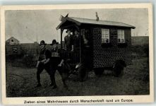 Ziehen eines Wohnhauses durch Menschenkraft AK Rekord