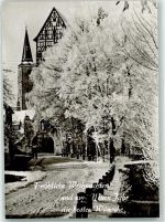 97702 W8732 Münnerstadt Gebrauchsspuren Fröhliche Weihnachten und zum neuen Jahr die besten Wünsche Kirche Fachwerk Winter Schnee Foto AK