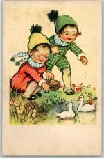 Kinder beim Füttern Ente
