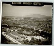 79415 W7848 Bad Bellingen , Baden FOTO KEINE AK Fliegeraufnahme des Ortes mit St. Leodegar Kirche Foto Original aus Archiv eines Ansichtskartenverlags Ort handschriftlich