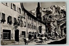 82467 W8100 Partenkirchen - Kühe ziehen durch das Dorf Ludwigstraße