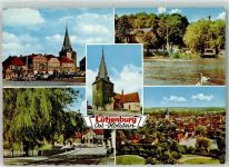 24321 W2322 Lütjenburg , Holst Foto AK Oldtimer Motorrad Marktplatz Kirche St.Michaelis Teich Schwäne