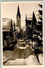 87561 W8980 Oberstdorf Foto AK Winter Kirche Kirchstrasse