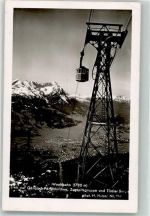 W8100 Garmisch-Partenkirchen Wankbahn oberhalb des Ortes mit Zugspitzgruppe Fotograf Hans Huber Hünengräber Wank-Haus Bergbahn Foto AK