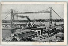 24103 W2300 Kiel , Ostsee Künstlerkarte Kaiserliche Werft Schwebefähre Kriegsschiff
