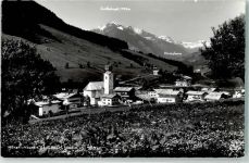 5753 Saalbach 1963 Foto AK mit Kath. Pfarrkirche hll. Bartholomäus