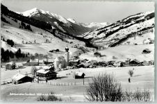 5753 Saalbach 1959 Winter Kohlmaislift mit Kath. Pfarrkirche hll. Bartholomäus im Schnee