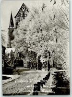 97702 W8732 Münnerstadt Gebrauchsspuren Fröhliche Weihnachten und zum neuen Jahr die besten Wünsche Kirche Fachwerk Winter Schnee Foto AK
