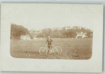 Mann mit seinem Rad auf freiem Feld Fahrrad Privatfoto AK