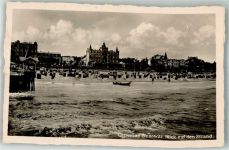17454 O2238 Zinnowitz , Ostseebad Foto AK Strand Ruderboot Strandkorb Ostseebad