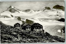 Kürsingerhütte Foto AK 2558 m Gr. Geiger Maurerkeeskopf Schnee Winter Hüttenstempel Alpengasthaus Postalm