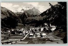 9971 Matrei in Osttirol Foto AK 975 m Kirche Berge Schnee