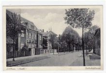 Lübtheen i. Meckl. mit Bahnhofstrasse gelaufen von 1938. Kleine Anhaftung oben links, sonst gut erhalten.