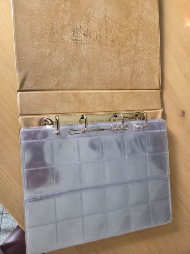 Münzalbum Braun, gebraucht mit 16 Münzhüllenje 24 Münzen bis 35 mm